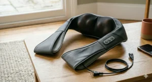 Detailed view of the intuitive control panel on a neck and shoulder massager.