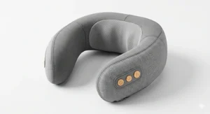 Studio view of an ergonomic, grey fabric heated neck massager.