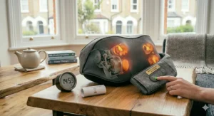 A demonstration of the shiatsu neck massager's safety features, displayed on a coffee table next to a digital clock showing the auto-off timing.