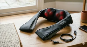 Close-up of rotating shiatsu nodes inside a neck and shoulder massager for deep tissue relief.