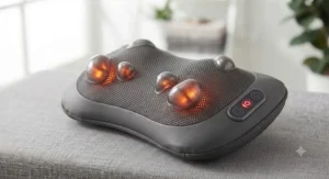 Close-up of infrared heating nodes glowing gently on a deep-tissue electric back massager.