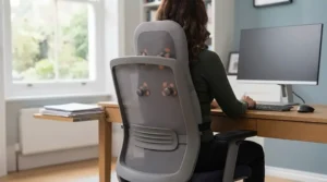 A shiatsu massage cushion fitted to an office chair, showing how to improve desk posture.