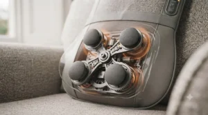 Detailed view of rotating massage nodes moving along the contour of a supportive back cushion.