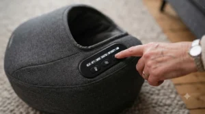 Close-up of simple digital controls on an electric foot massager for arthritis pain management.