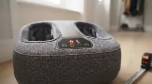 Illuminated heating element indicator glowing softly on a compact foot massager.